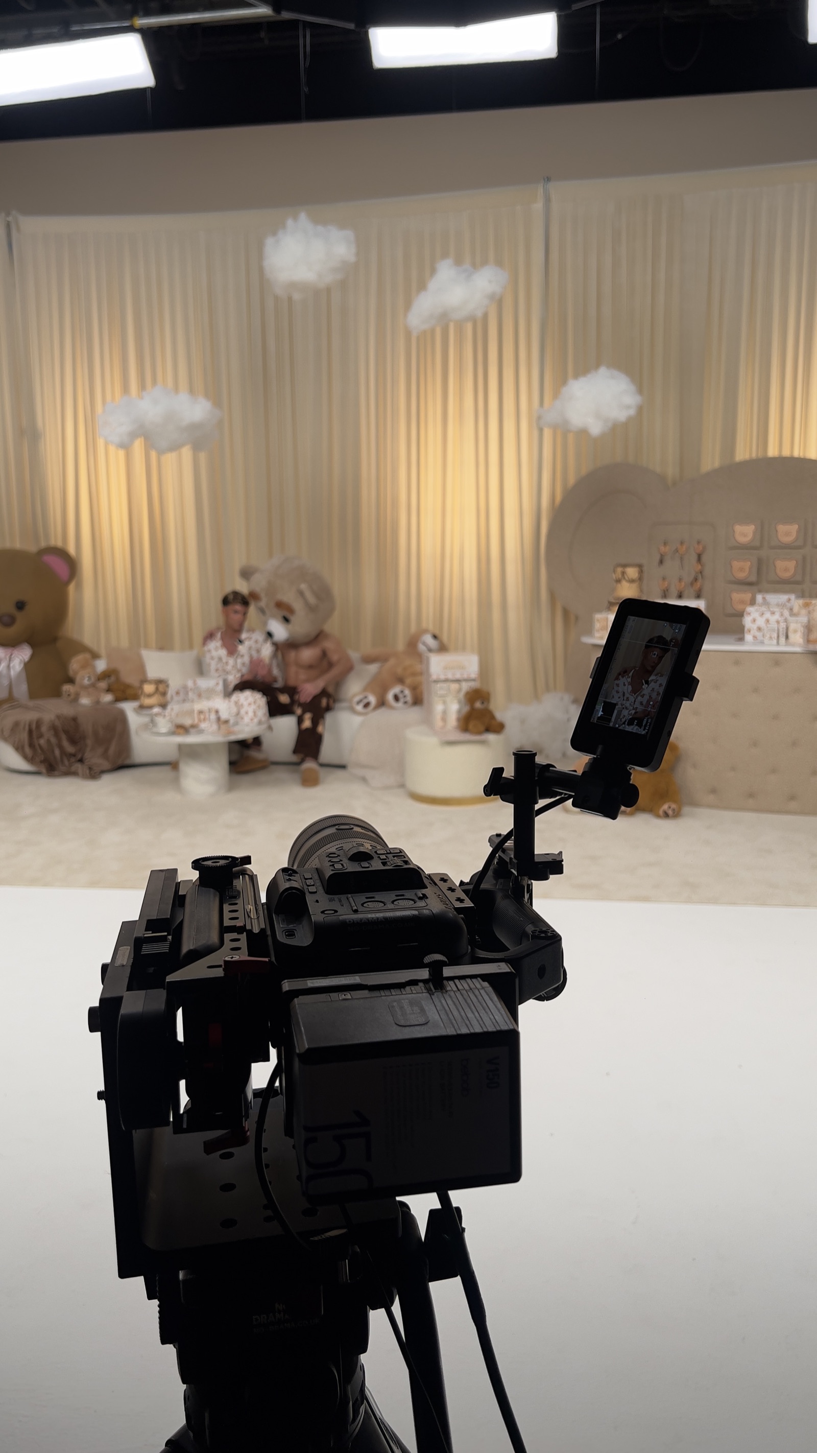 Crew dressing a teddy-bear themed set before a broadcast