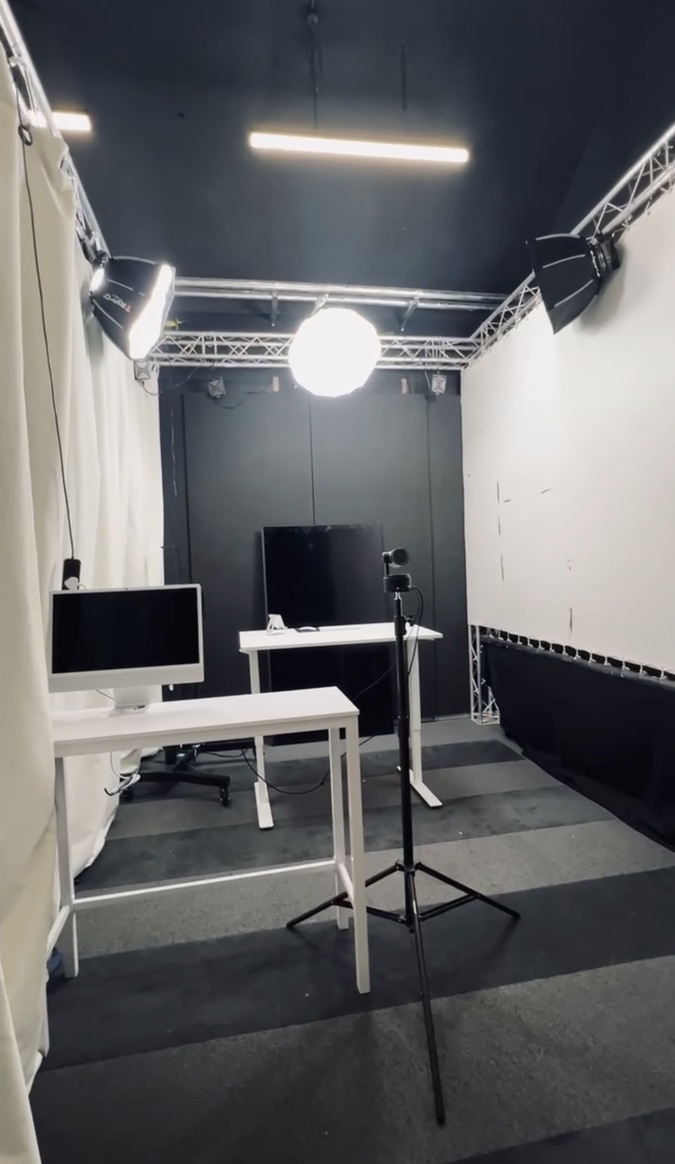 A presenter on camera mid-show under studio lighting